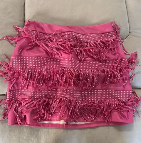 Pink faux leather fringe skirt