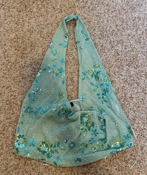 Green beaded halter top