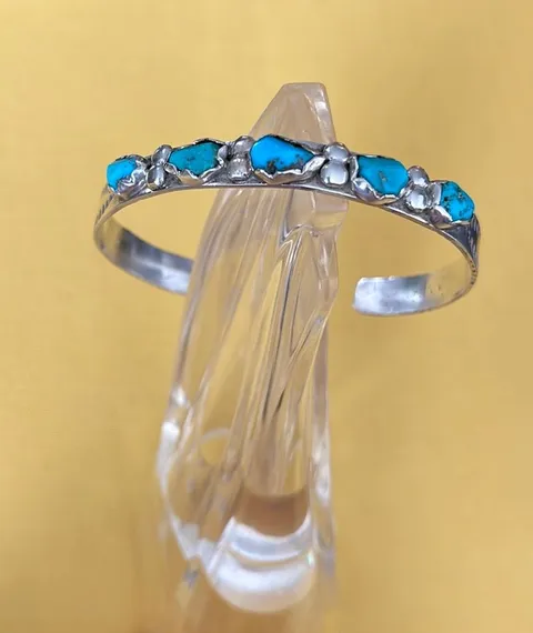 Vintage Navajo SC Nastacio sterling silver turquoise stone cuff bracelet.