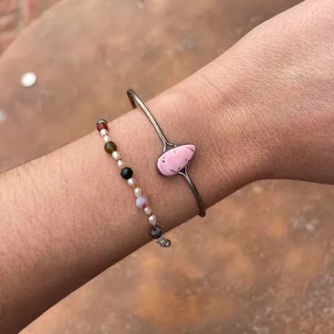 Pink stone adjustable bangle with silver accents