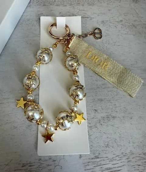 NIB Dior VIP Pearl Gold Star Holiday Bag Charm