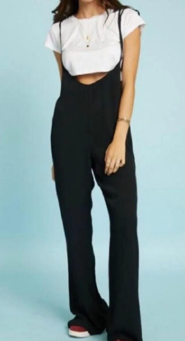 NWT black jumpsuit with adjustable length tie straps. Sz M.
