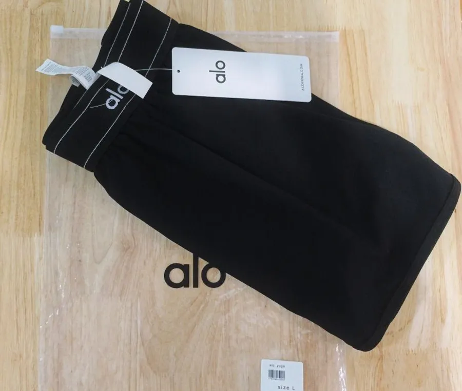 Alo Yoga tennis skirt with built-in shorts and pockets